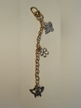 Gold-Tone Sakura Flower Charm with White Enamel
